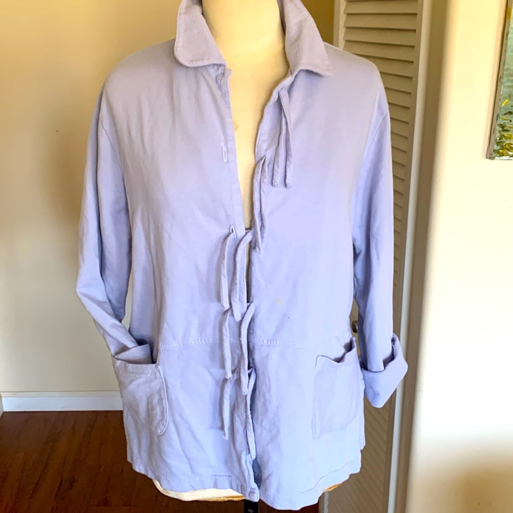 Nice 100% comfy cotton, pretty baby blue color, with fringe tie front.